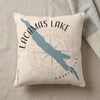 Cream pillow with Lacamas Lake Washington map graphic and compass rose.