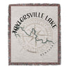 Woven blanket with "Taylorsville Lake Kentucky" text and compass rose design.