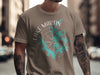 Brown t-shirt with a compass design featuring Lake Martin and Alabama.