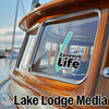 Sticker on boat window says "Conesus Life" and "Lake Lodge Media LLC" logo.