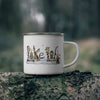 White enamel mug featuring alphabet letters in a winter fishing theme.
