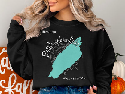 Black sweatshirt with a teal outline of Rattlesnake Lake and compass rose.