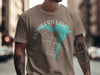 Brown t-shirt with Rushford Lake map graphic and compass design.