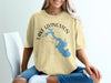 Yellow t-shirt with Lake Livingston Texas map and compass graphic.