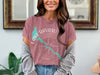 Rose t-shirt with turquoise Lake Havasu outline and compass graphic.