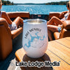 A white stainless steel wine tumbler with a Lake Monroe Indiana map print rests on a boat table.