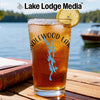 Glass with iced tea, lemon slice, and "Candlewood Lake" compass design.