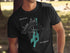 Black t-shirt with "Beautiful Balsam Lake Ontario" graphic and compass rose.