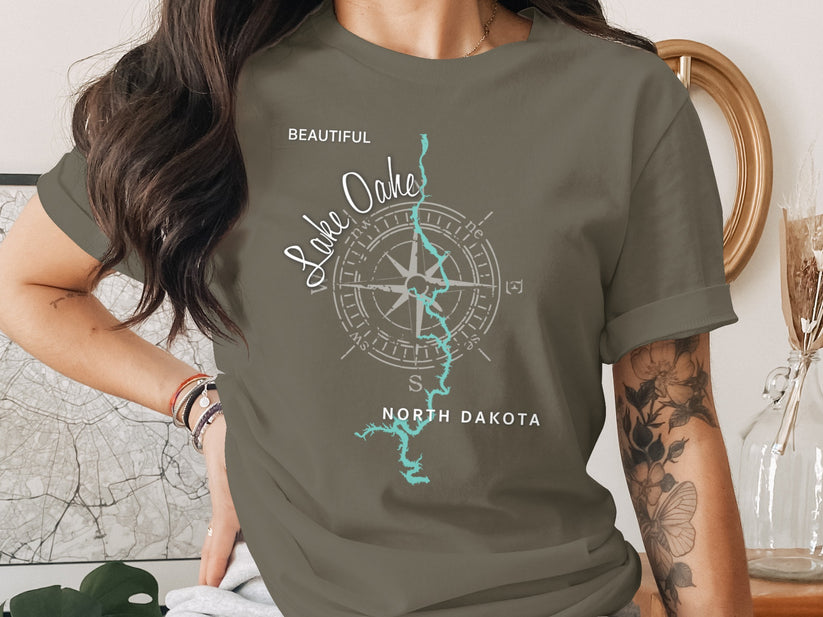 T-shirt with compass rose and "Beautiful Lake Oahe North Dakota" text.