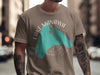 T-shirt with turquoise Lake Manawa Iowa graphic and compass design.