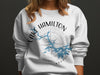 White sweatshirt with Lake Hamilton Arkansas graphic and compass design.