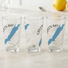 Three clear glasses with Green Bay, Wisconsin map and compass design.