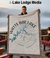 Blanket with Watts Bar Lake map design and compass rose on a neutral background.