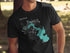 Black t-shirt with a teal compass and map of Lake Livingston, Texas.