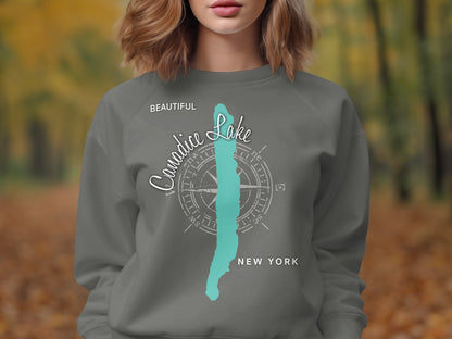 Gray sweatshirt with "Canadice Lake NEW YORK" and compass design.