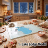 A glass cutting board featuring a map of Lake George, Florida rests on a kitchen counter amid baking supplies.