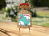 Wooden sled ornament with "Merry Christmas from Lake Calhoun" text.
