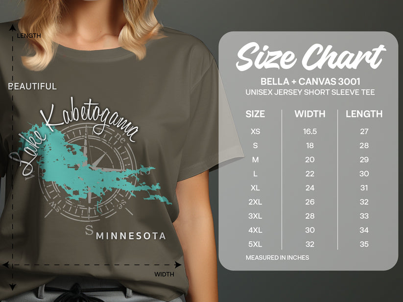 T-shirt size chart with compass graphic and "Lake Kabetogama Minnesota" text.