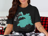 Black t-shirt featuring a teal Big Lake Arizona map graphic with compass rose.