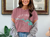 Pink t-shirt with white text "PACTOLA LAKE" and compass design with South Dakota shape.
