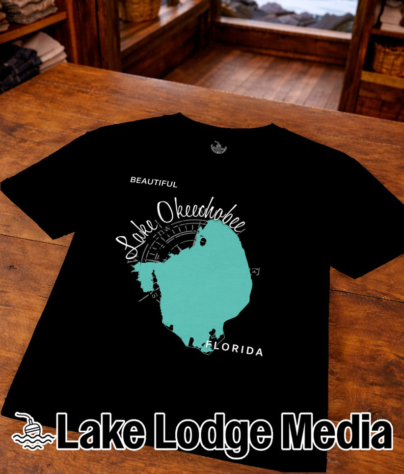 Black t-shirt with turquoise Lake Okeechobee, Florida map graphic.