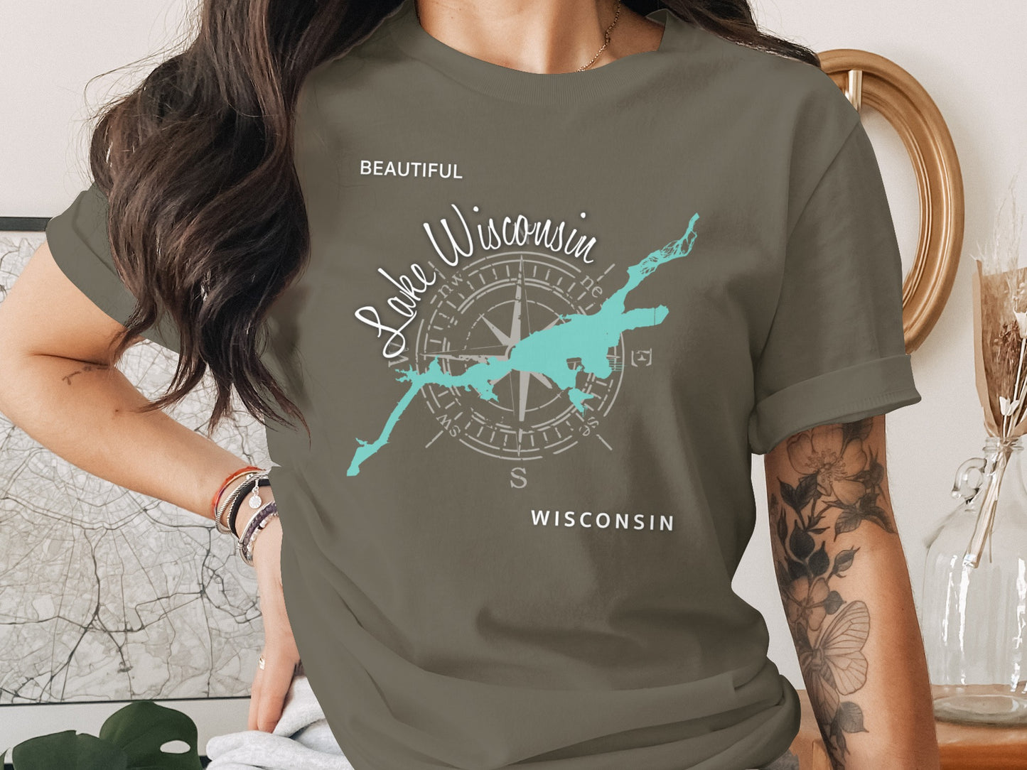 T-shirt featuring a compass rose and the outline of Wisconsin.