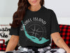 Black t-shirt with Sanibel Island Florida map, compass, and text.