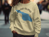 Cream sweatshirt with blue Catalina Island map and compass graphic.