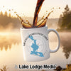 White mug with Mooselookmeguntic Lake map and compass design.
