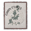 Woven blanket with Chain O'Lakes map and compass rose design.