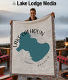 Woven throw with Lake Calhoun, Georgia map and "Lake Lodge Media" logo.
