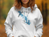 White hoodie with blue map shape and text: 'Waurika Lake Oklahoma'