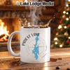 White mug with Priest Lake Idaho map and compass design, steam rising from coffee.