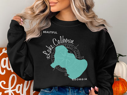 Black sweatshirt with "Beautiful Lake Calhoun Georgia" and compass rose graphic.