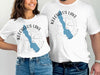 White t-shirts with Keechelus Lake map and compass design.