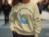 Light yellow crewneck sweatshirt with Parker Canyon Lake Arizona map and compass graphic.