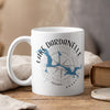 White mug with blue Lake Dardanelle map and compass design.