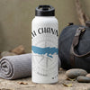 White water bottle with black lid, compass design, blue whale, and text.