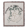 Woven blanket with Pomme de Terre Lake Missouri map and compass design.