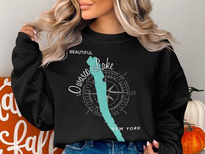 Black sweatshirt with "Owasco Lake, New York" and compass graphic.