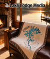Woven blanket with Chatuge Lake map and compass design, "North Carolina" text.