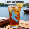 Glass with iced tea and New Hampshire's Newfound Lake map design.