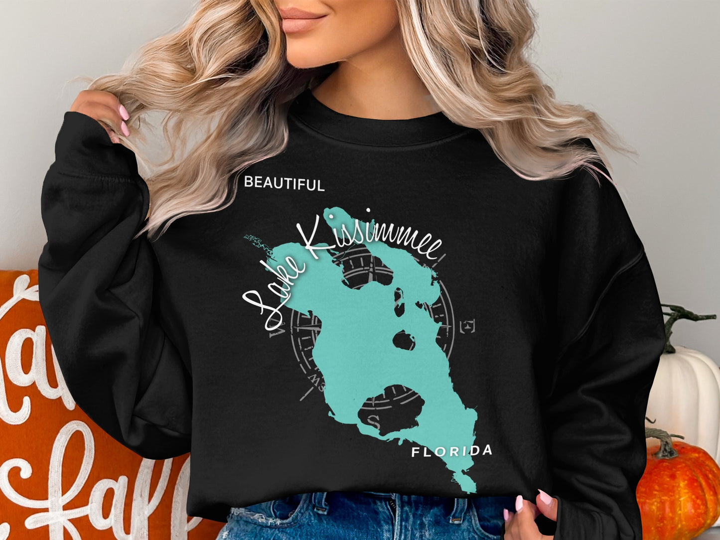 Black sweatshirt with turquoise outline map of Lake Kissimmee, Florida.