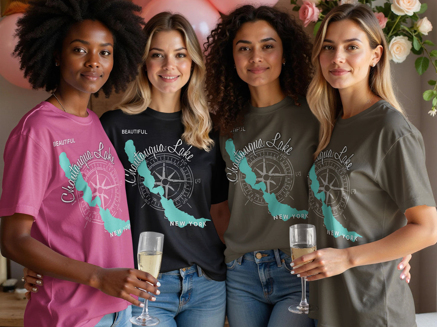 Four women in Chautauqua Lake t-shirts, two holding champagne flutes.