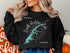 Black sweatshirt with "Beautiful South Holston Lake Virginia" compass graphic.