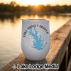 A white insulated tumbler featuring a blue map of Lake Stanley Draper, Oklahoma, rests on a wooden dock at sunset.