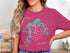 Pink t-shirt with "Pomme de Terre Lake Missouri" and compass rose.