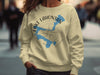 Sweatshirt with blue Lake Lahontan map graphic and compass rose design.