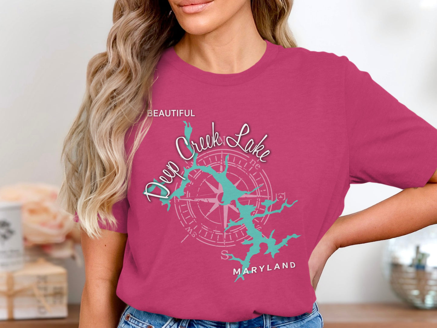 Pink t-shirt featuring a stylized map of Deep Creek Lake, Maryland.