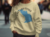 Light yellow sweatshirt with blue Lake Lawtonka map and compass graphic.
